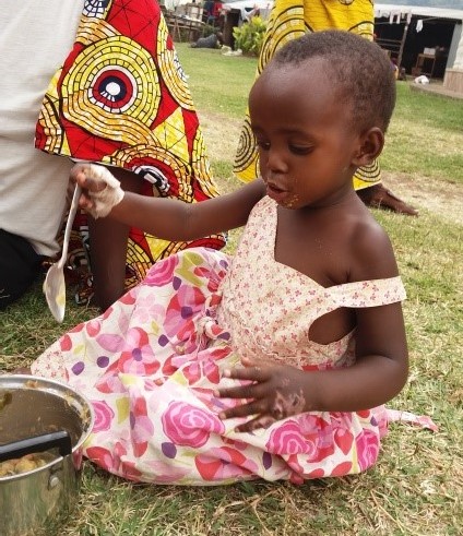 Comfort enjoying a nutritious meal that will help her burnt hand heal